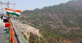 "India's Chenab Bridge Triumph: A Symbol of Pride or Controversy?"  Chenab Rail Bridge construction, futuristic infrastructure development, India's engineering achievements